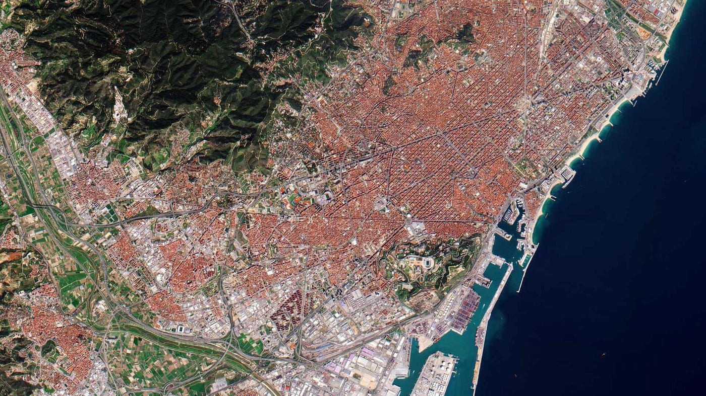 Satellite view of a coastal city and port